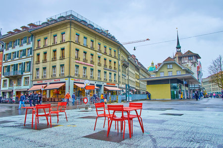 BERN, SWITZERLAND - MARCH 31, 2022: Urban scene on Waisenhausplatz square, one of the oldest in the...