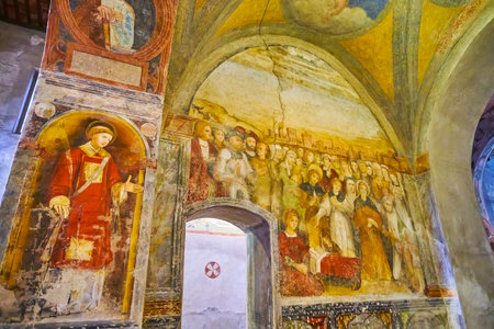 LUGANO, SWITZERLAND - MARCH 14, 2022: The medieval colored frescoes in Santa Maria degli Angeli Church, Lugano, Switzerlandのeditorial素材