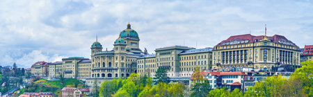 BERN, SWITZERLAND - MARCH 31, 2022: Panorama of Bundeshaus building (Fedral Palace) and surrounding...