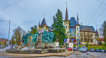 BERN, SWITZERLAND - MARCH 31, 2022: Panorama of Welttelegrafen-Denkmal monument and building of Bern Historical Museum on background, on March 31 in Bern, Switzerlandのeditorial素材
