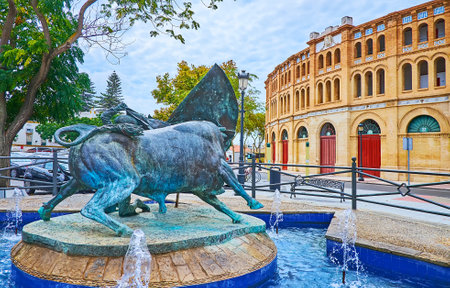 EL PUERTO, SPAIN - SEPT 21, 2019: The bronze Monumento a Paquirri with fountain on Plaza de Toros, on Sept 21 in El Puerto, Spainのeditorial素材