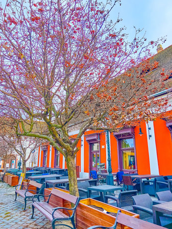 Empty outdoor patio on winter day on Fo ter (Main Square) in Obuda, Budapest, Hungaryのeditorial素材