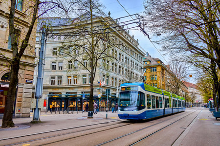 ZURICH, SWITZERLAND - APRIL 3, 2022: Bahnhofstrasse the central avenue in downtown with stores and...