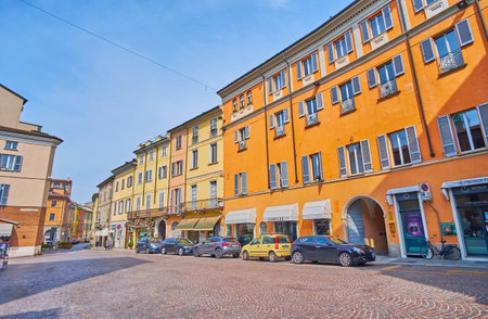 PIACENZA, ITALY - APRIL 6, 2022: Historic Piazza del Borgo square with colored housing, small restaurants and shops, Piacenza, Italyのeditorial素材