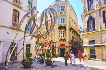 MALAGA, SPAIN - SEPT 28, 2019: The modern Panta Rei sculpture, located on shopping Plaza del Siglo square of old town, Malaga, Spainのeditorial素材