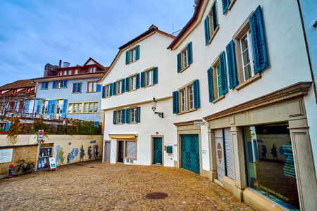 ZURICH, SWITZERLAND - APRIL 3, 2022: The quet residential Obere Zaune street with gallery and art...