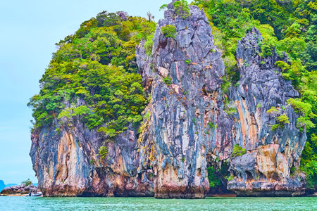 Ko Ta Pu rock formation and James Bond Island cliffs, covered with plants, the view from the sea, Phang Nga Bay, Thailandの写真素材