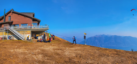 Panorama of the mountain slope of Mount Cimetta with a tourist center and restaurant, Ticino, Switzerlandの写真素材