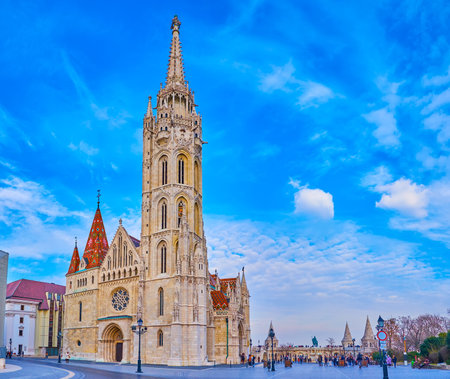 Iconic Gothic Matthias Church in front of the Fisherman's Bastion on Holy Trinity Square, Budapest, Hungaryの写真素材