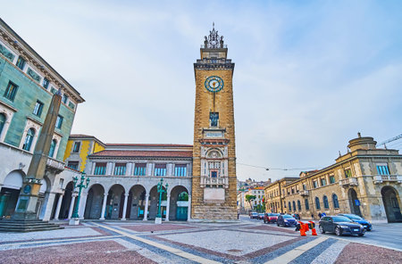 The sculptured stone Memorial Tower, located on Piazza Vittorio Veneto in Citta Bassa in Bergamo, Italyの写真素材