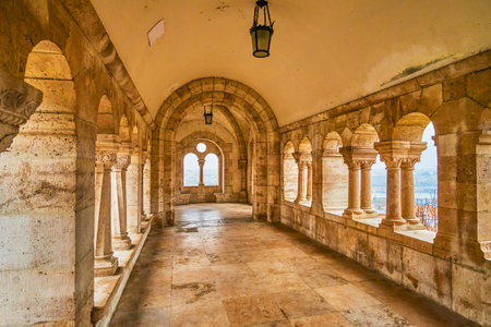 Arched gallery of stone Fisherman's Bastion with scenic windowframes, Budapest, Hungaryの写真素材