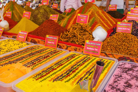 The fruit and herbal tea powders, various spices and other traditional goods in stall of Cumartesi Bazaar, Antalya, Turkeyの写真素材