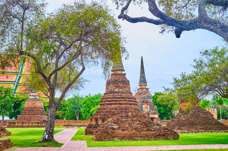 The ruins brick shrines and chedis of Wat Phra Si Sanphet complex, Ayutthaya, Thailandの写真素材