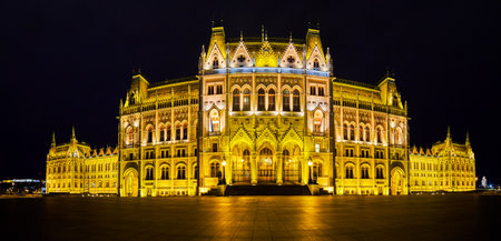 Night panorama of illuminated building of Hungarian Parliament, located on Lajos Kossuth Square, Budapest, Hungaryの写真素材