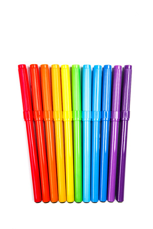 Rainbow of colored felt tip pens isolated on whiteの写真素材