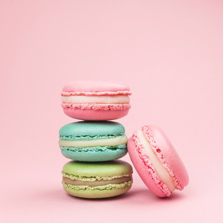 Sweet and colourful french macaroons on retro-vintage backgroundの写真素材