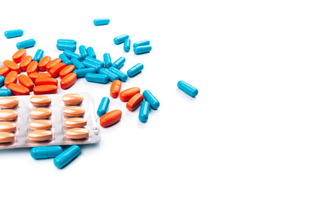 Different colored pills isolated on white backgroundの写真素材