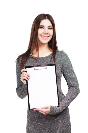 Beautiful young woman holding black folder with white sheet copy spaceの写真素材