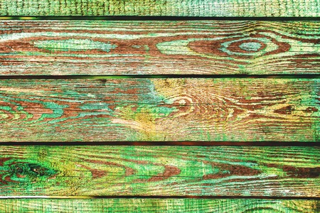 Texture of old wooden planks with peeling paintの写真素材