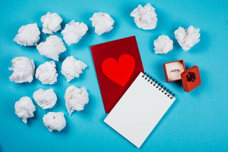 Valentines card and many crumpled sheetsの写真素材