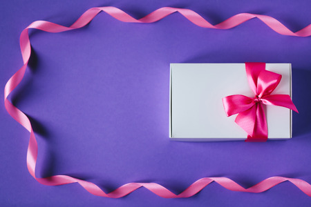 White present box with pink bow