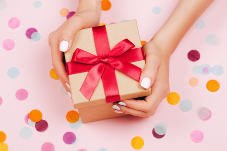 Hands holding present boxの写真素材