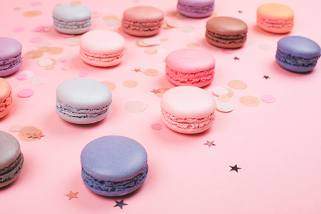 Group of pastel colorful macarons on trendy background.の写真素材