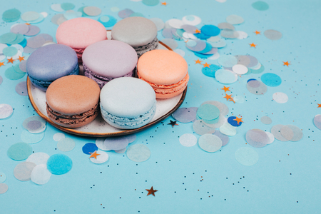 Group of pastel colorful macarons on trendy background.の写真素材