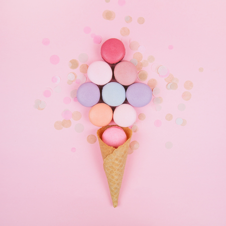 Group of pastel colorful macarons on trendy background.の写真素材
