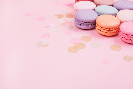 Group of pastel colorful macarons on trendy background.の写真素材