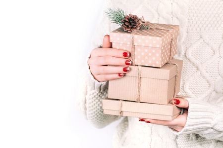 Hands with craft gift boxesの写真素材