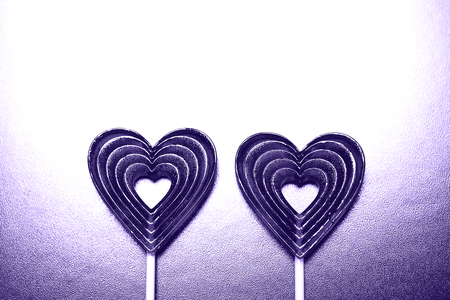 Red heart-shape lollipopsの写真素材