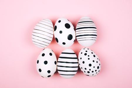 Many easter eggs on pink. Flat lay.の写真素材