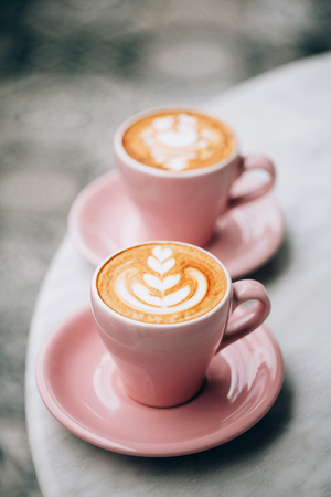 Two cups of cappuccino.の写真素材