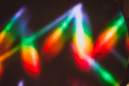 Holographic light with rainbow rays. Perfect as trendy backdrop.の写真素材