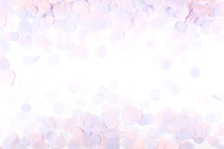 Pink pastel confetti on whiteの写真素材