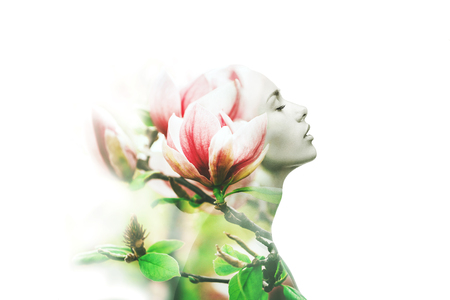 Multiple exposure. Woman and magnoliaの写真素材