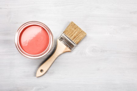 Living Coral fresh painted wooden board. Renovation concept. Top view. Color of the year 2019. Renovation concept.の写真素材