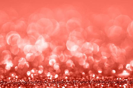 Living Coral glitter bokeh background. Color of the year 2019. Main trend concept. Natural and authentic mood.の写真素材