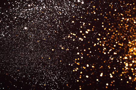 Some flying snowflakes on black background.の写真素材