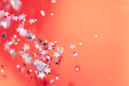 Living Coral glitter bokeh background. Color of the year 2019. Main trend concept. Natural and authentic mood.の写真素材