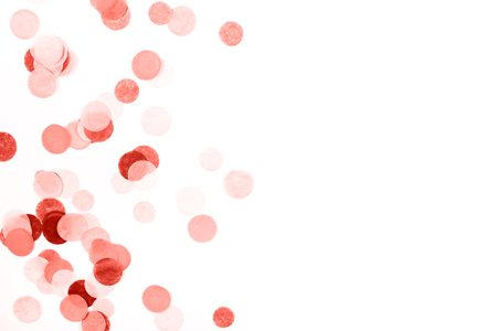 Living coral confetti on white background. Festive backdrop for your design.の写真素材