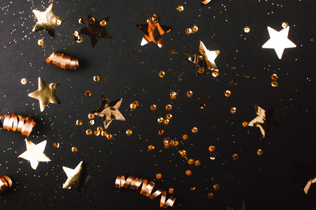 Golden stylish line of decoration on black background. Place for text. Festive concept.の写真素材