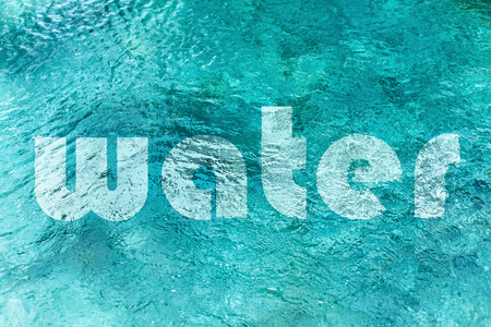 Texture of swimming pool with word WATER on it. Perfect paradise backdrop from Baliの写真素材