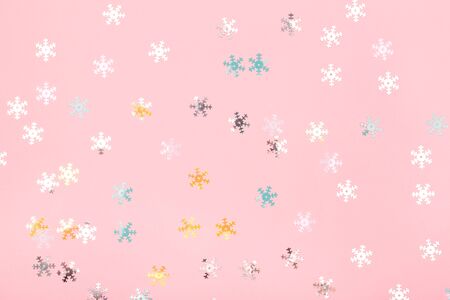 Creamy background with delicate holographic snowflakes. Perfect backdrop for your design.の写真素材