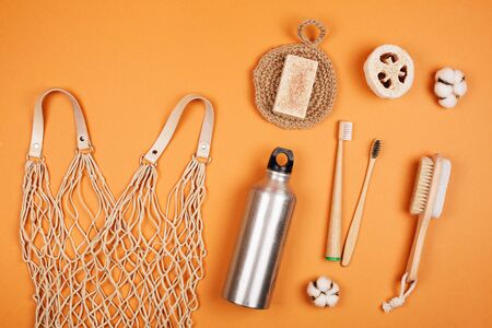 Zero waste living concept. Special objects on orange pastel backgroundの写真素材