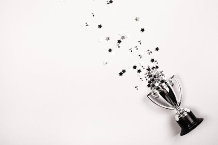 Champion cup on grey background, Flat lay style. Open composition.の写真素材