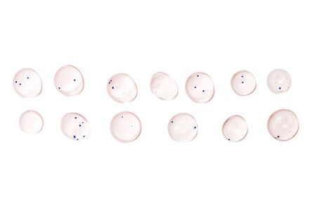 Hyaluronic acid drops isolated on white background.