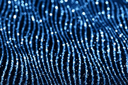 Blue sparkling abstract background. Festive concept. Color of the year 2020 concept.の写真素材