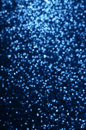 Blue sparkling abstract background. Festive concept. Color of the year 2020 concept.の写真素材